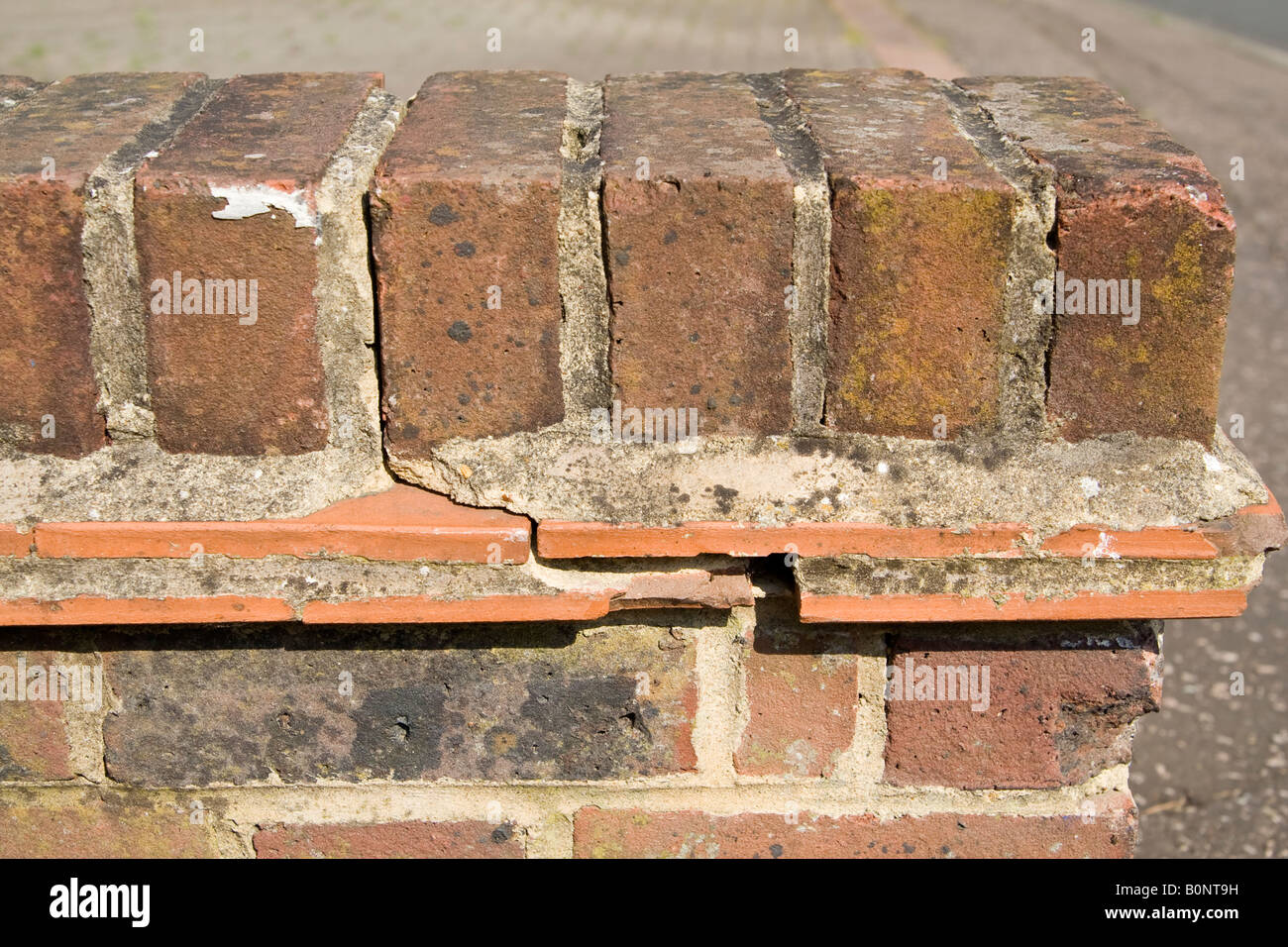 A cracked ^garden wall, UK Stock Photo Alamy