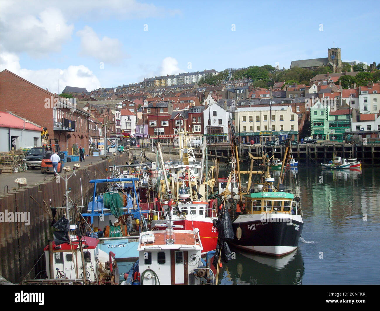 Trawler feet berthed in harbour, Scarborough, North Yorkshire, England. Stock Photo