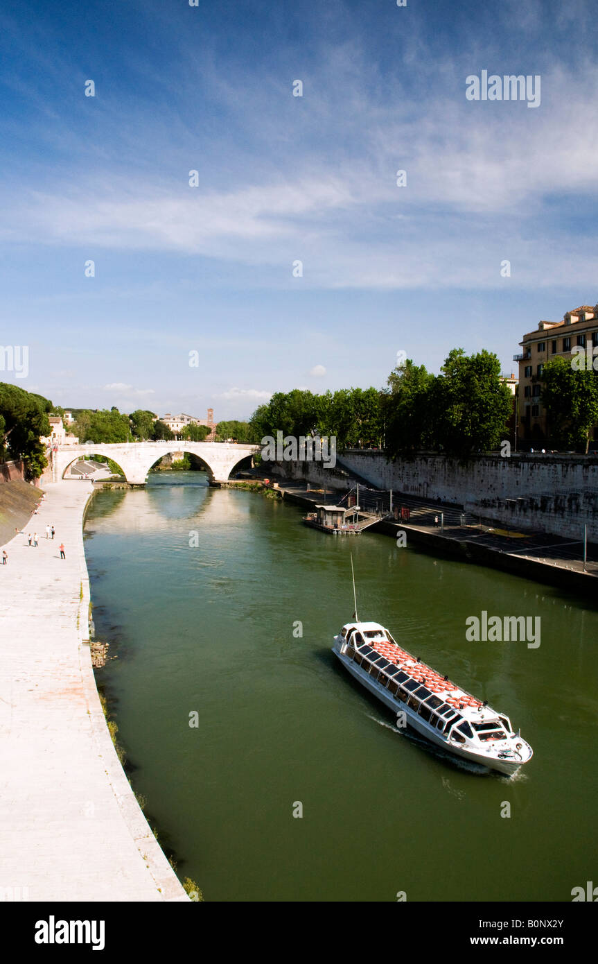 Tourist boat on the Tiber river, Rome Stock Photo