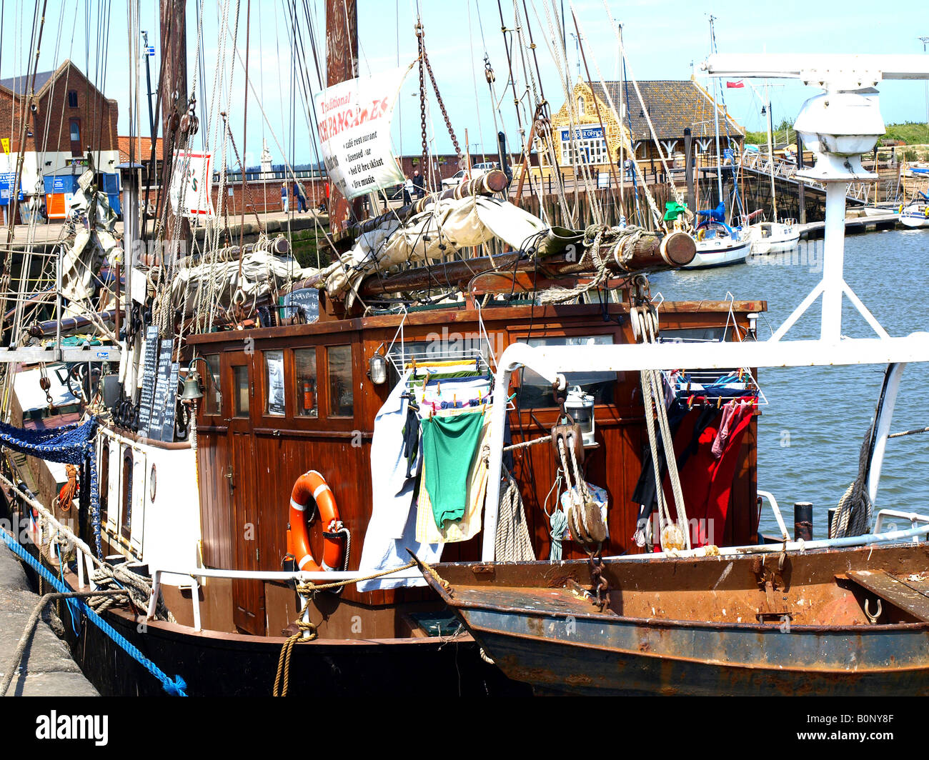 the wheelhouse and deck of a masted sailing ship at the quayside,wells next to sea,norfolk,uk