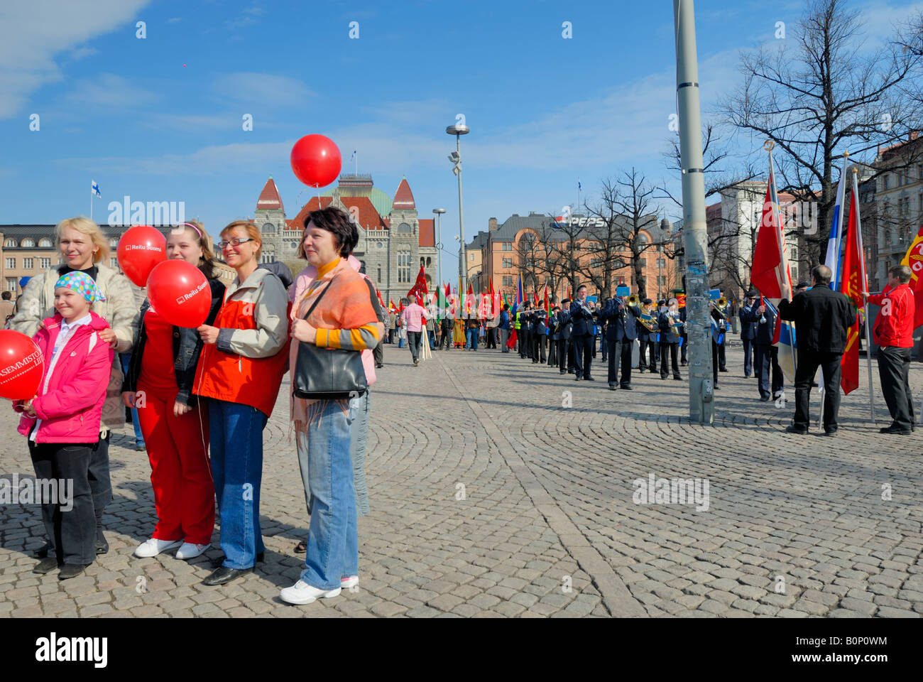 A family portray and the Finnish labour union, SAK, May Day parade, Helsinki, Finland, Europe. Stock Photo