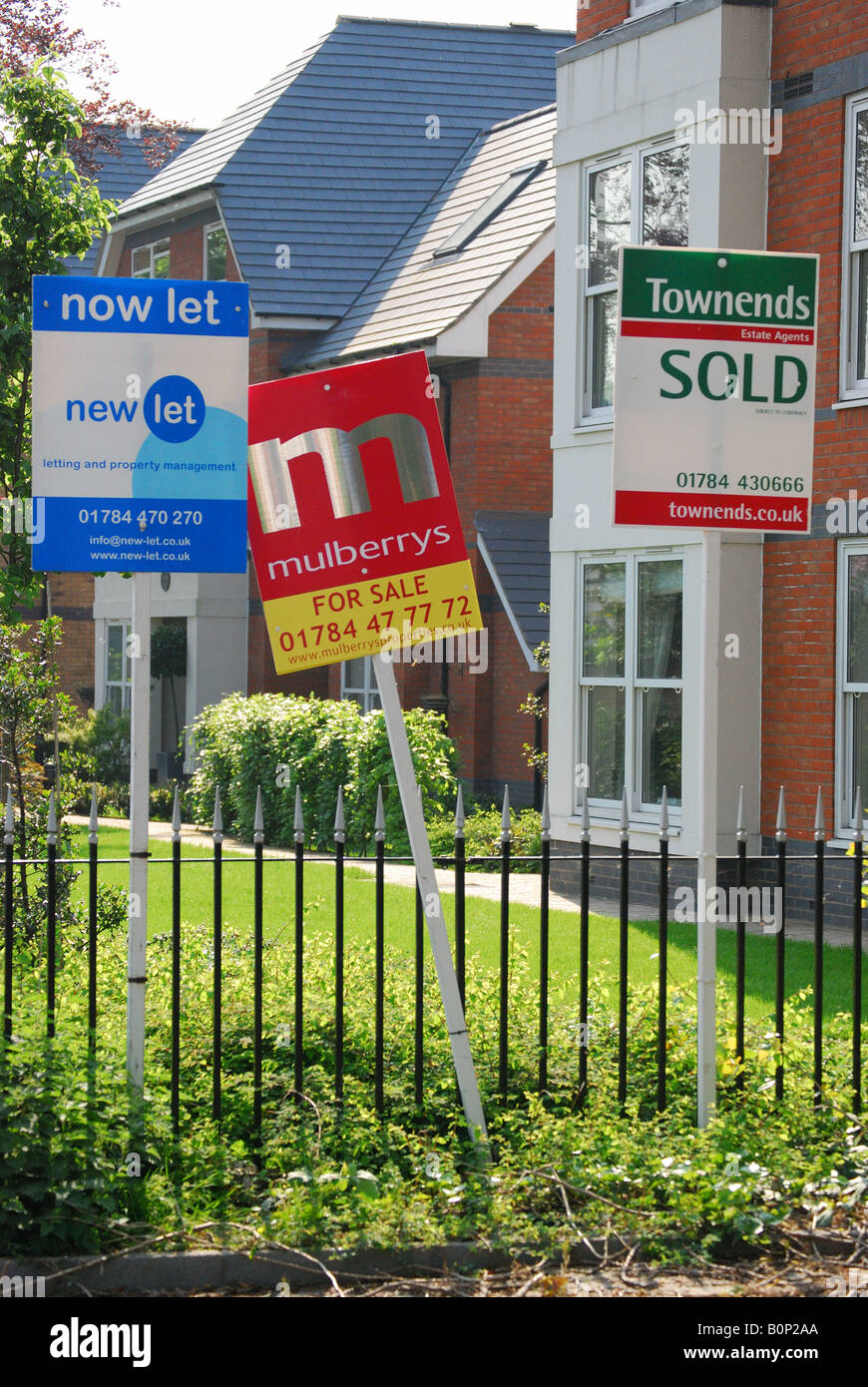 Estate agent signs, High Street, Egham, Surrey, England, United Kingdom