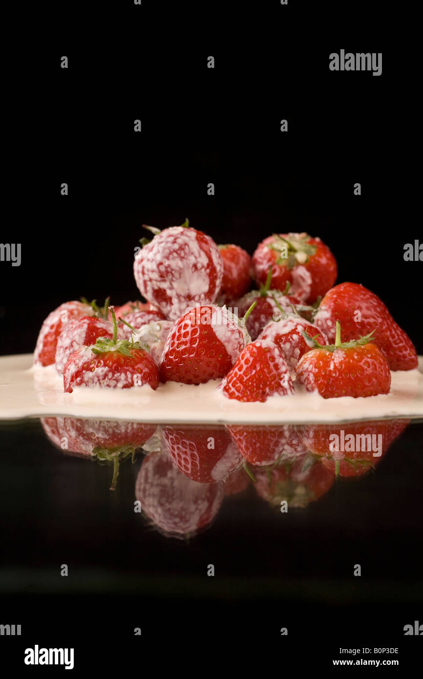 Strawberries and cream Stock Photo