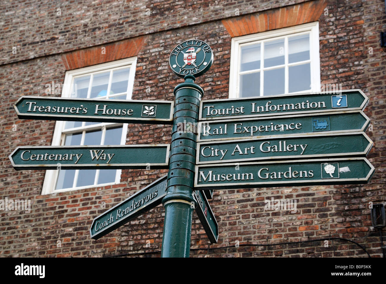 tourist signpost showing directions to popular attractions minster yard york north yorkshire england uk Stock Photo