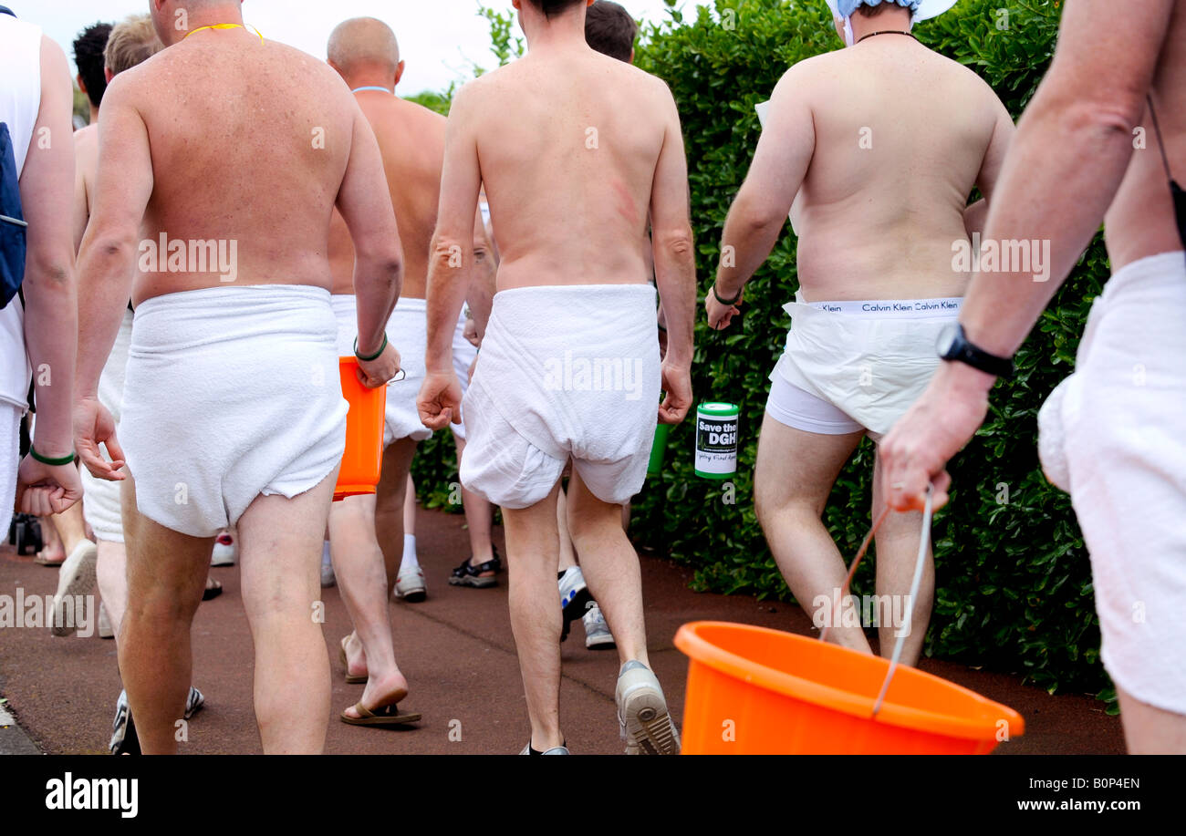Men wearing nappies protesting at proposed NHS hospital cuts in Eastbourne  Stock Photo - Alamy