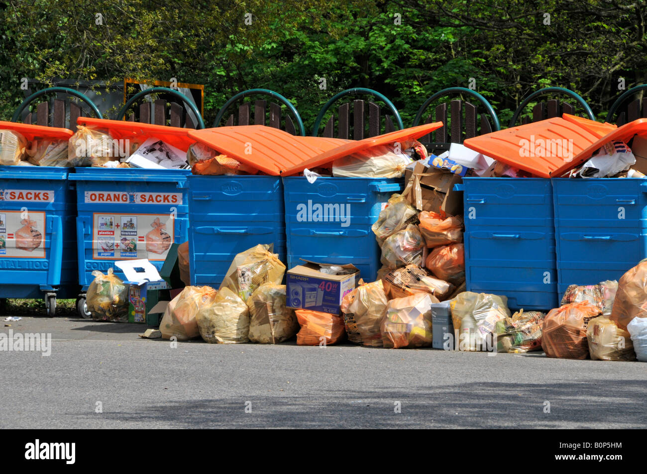 Local council public rubbish & recycling drop off layby overflowing