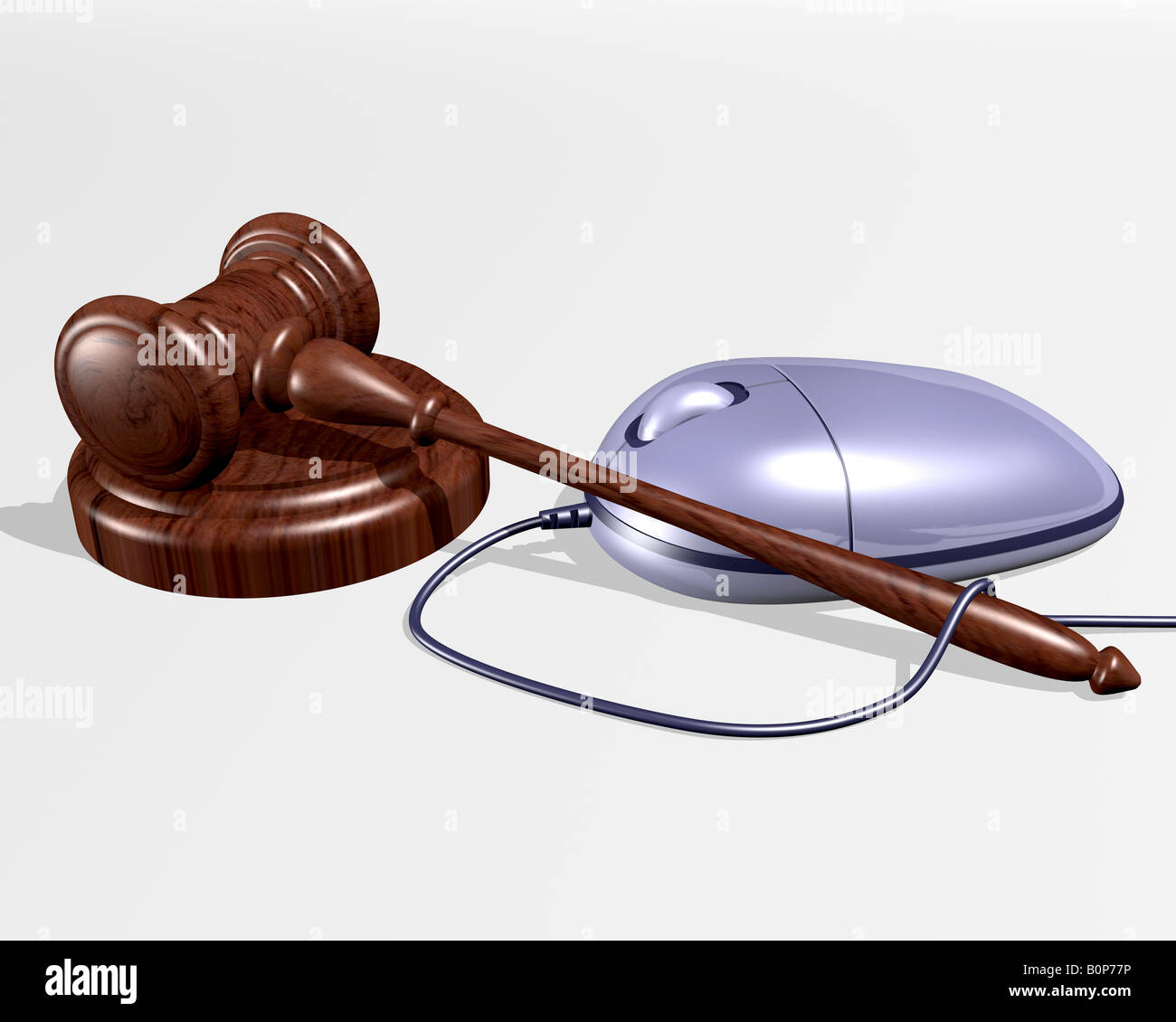 A gavel resting near a computer mouse representing Internet auctions Stock Photo