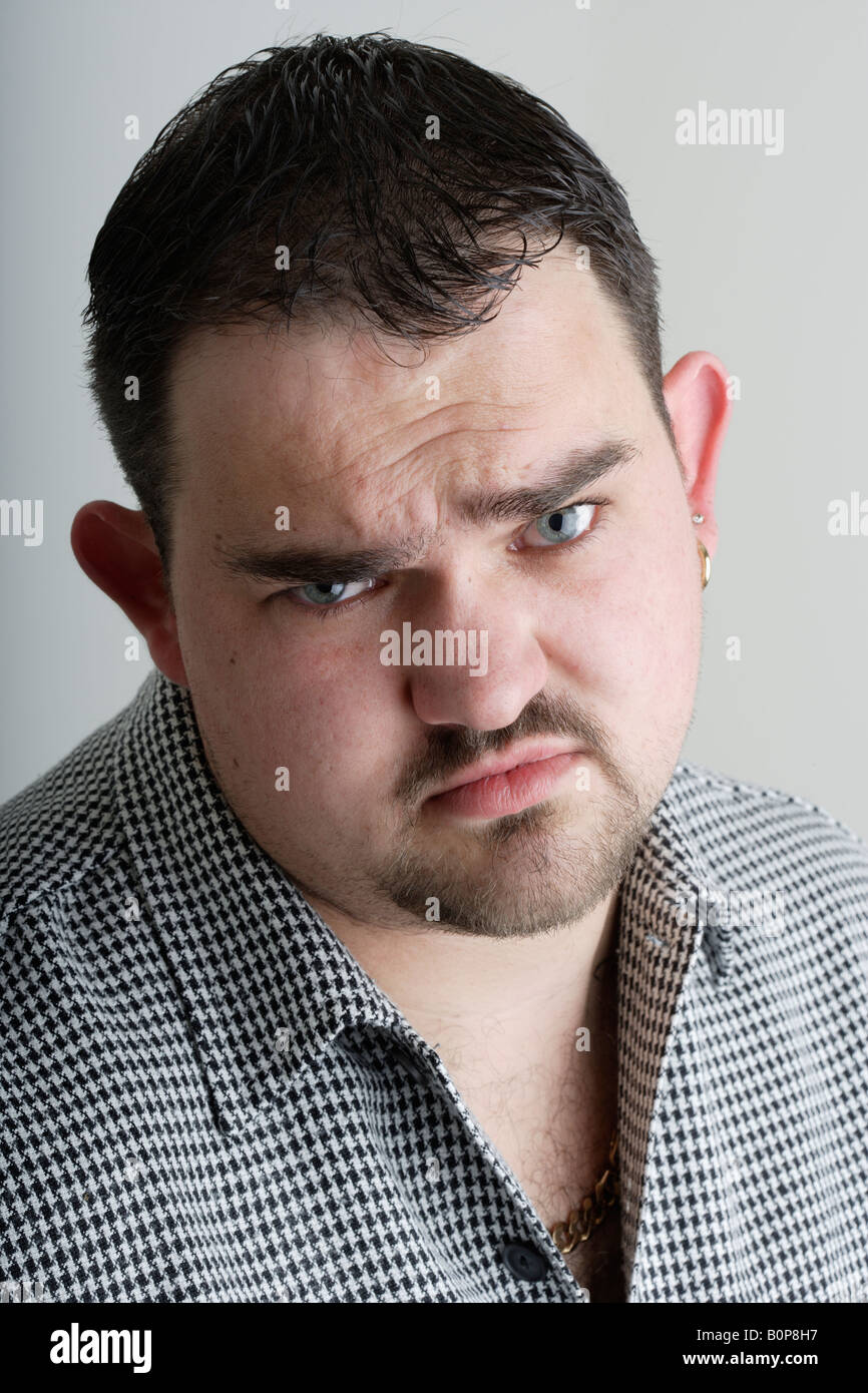 Angry and mean looking man Stock Photo Alamy