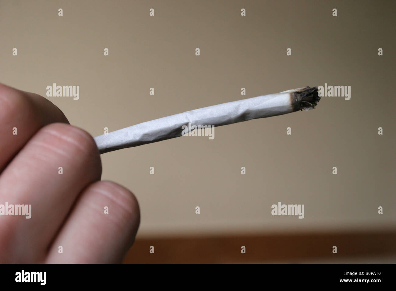 A cannabis spliff cigarette or joint being smoked, Amsterdam, Holland, The Netherlands. Stock Photo
