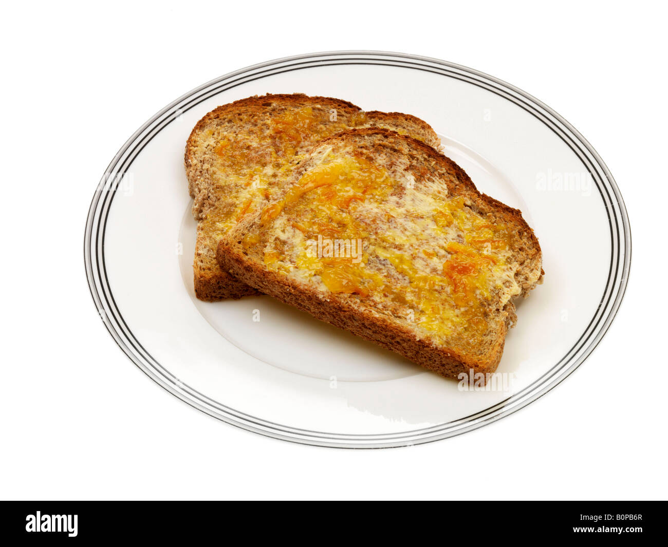 Fresh Sweet Wholemeal Toast With Marmalade Isolated Against A White Background With A Clipping Path And No People Stock Photo