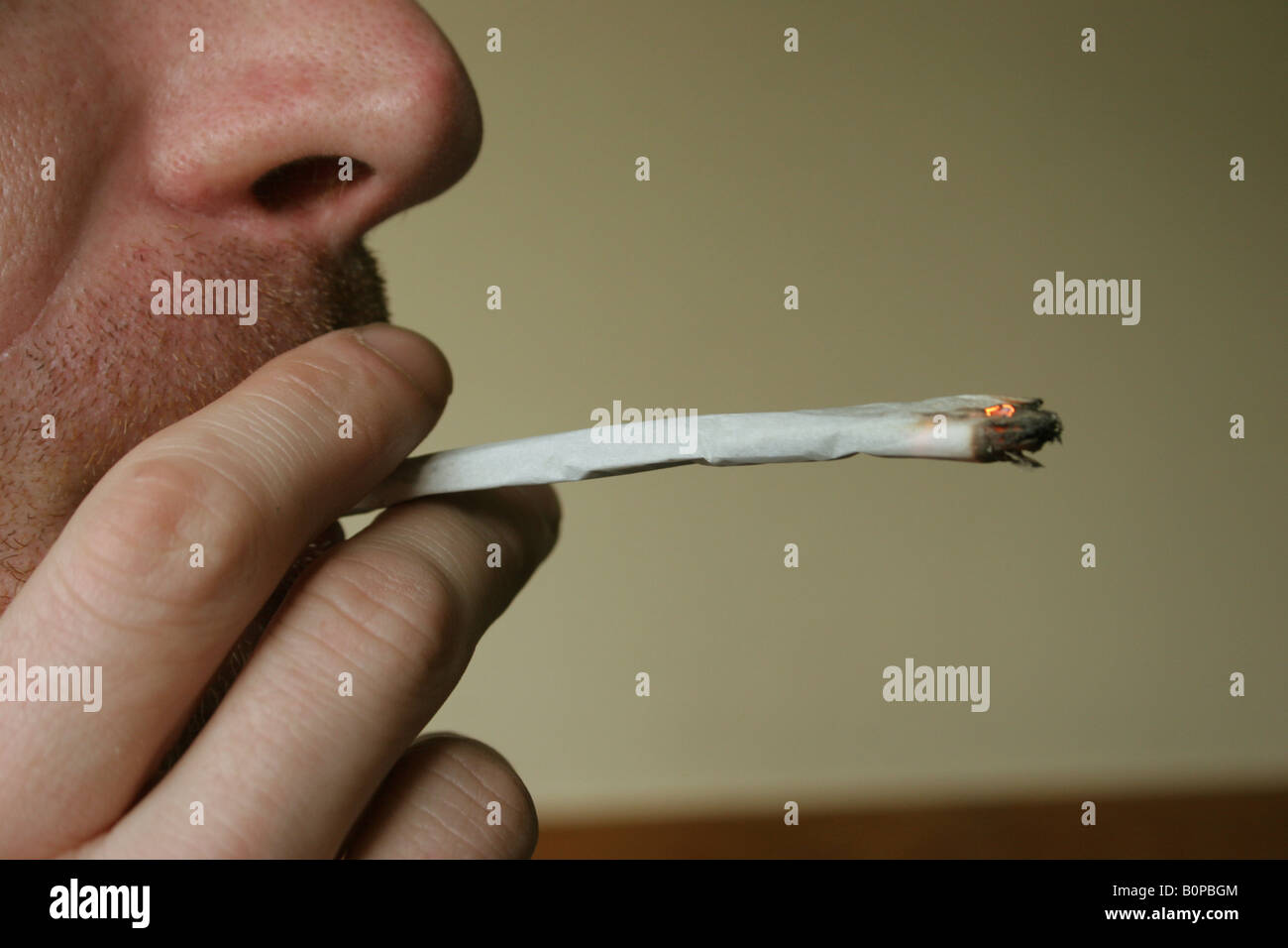 A cannabis spliff cigarette or joint being smoked, Amsterdam, Holland, The Netherlands. Stock Photo