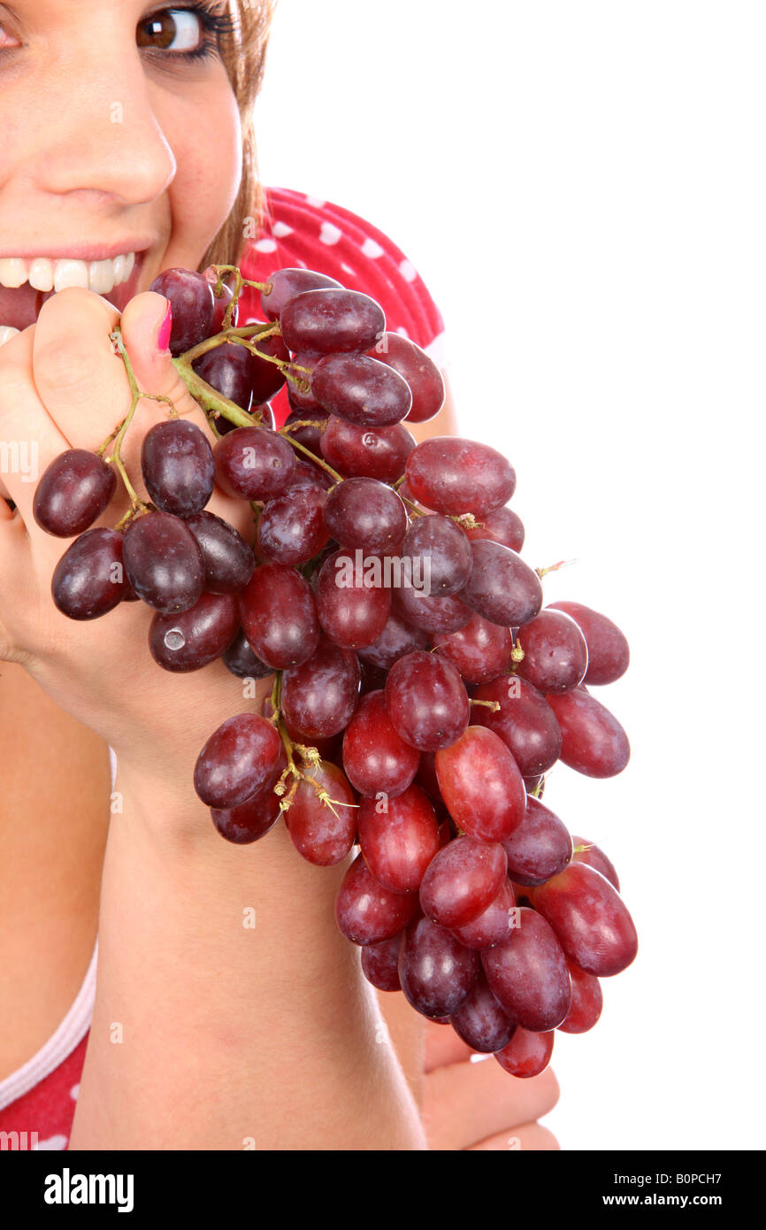 Young Woman Eating Red Grapes Model Released Stock Photo - Alamy