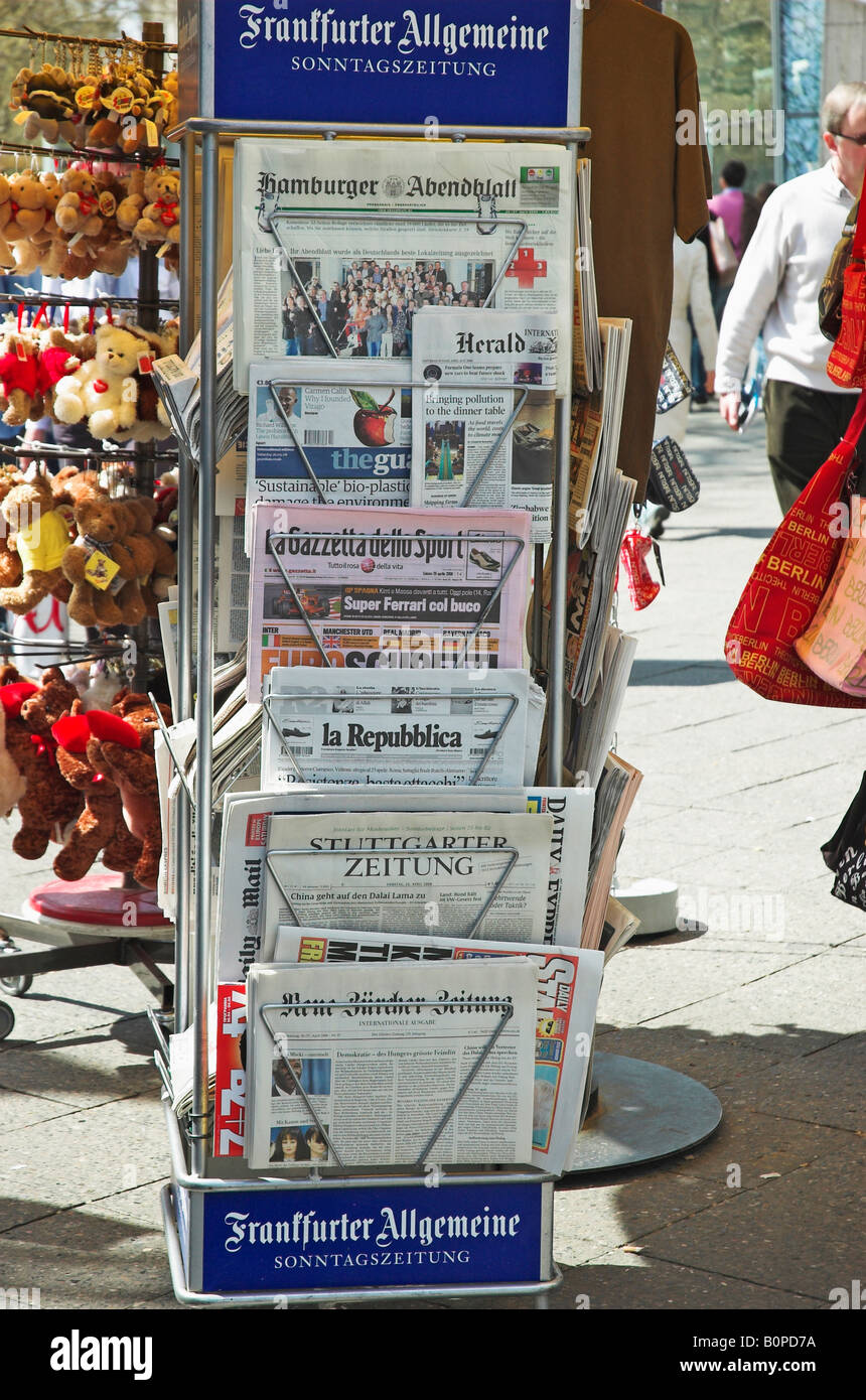 International daily newspapers for sale at a newspaper stand Berlin Germany Stock Photo