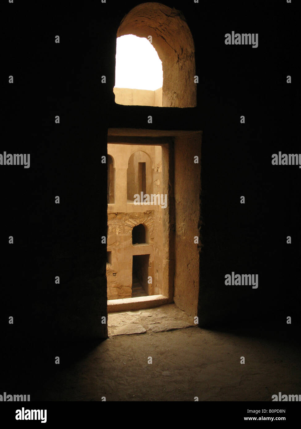 An arched window inside Qasr al Harana Omayyad desert castle, Jordan, Middle East Stock Photo