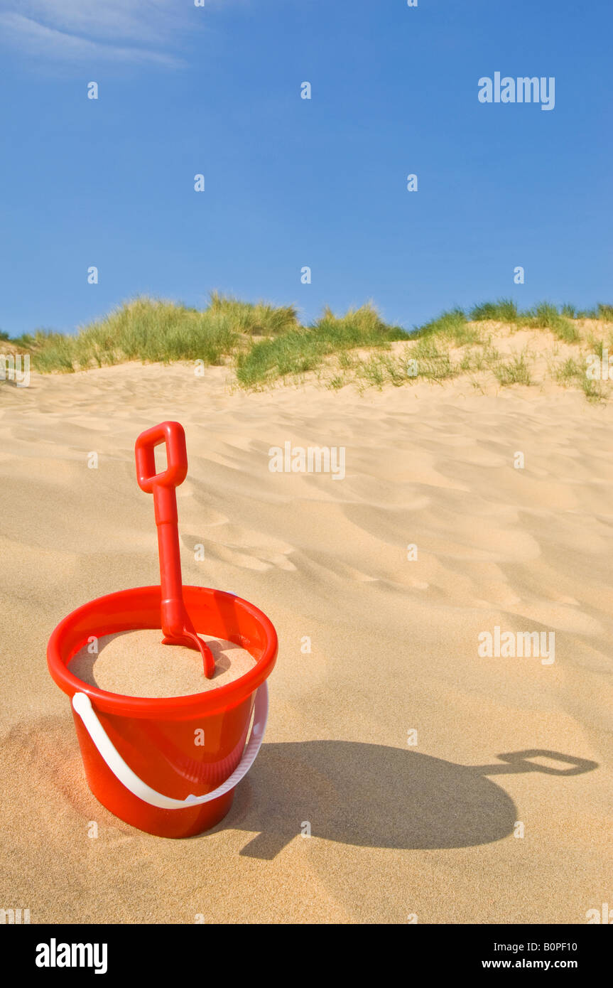 A concept image of a "bucket and spade" beach holiday Stock Photo Alamy