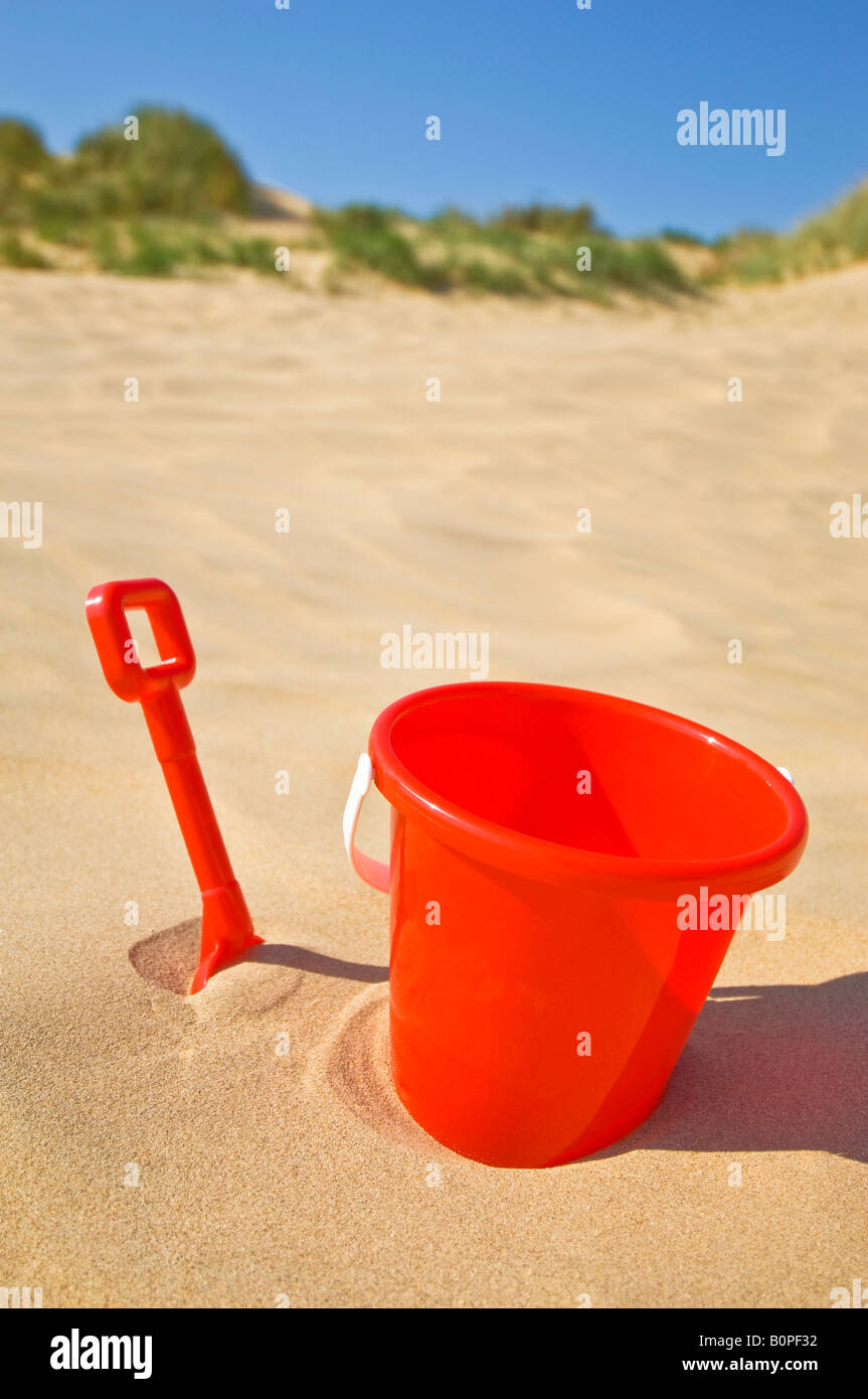Red bucket yellow spade hires stock photography and images Alamy