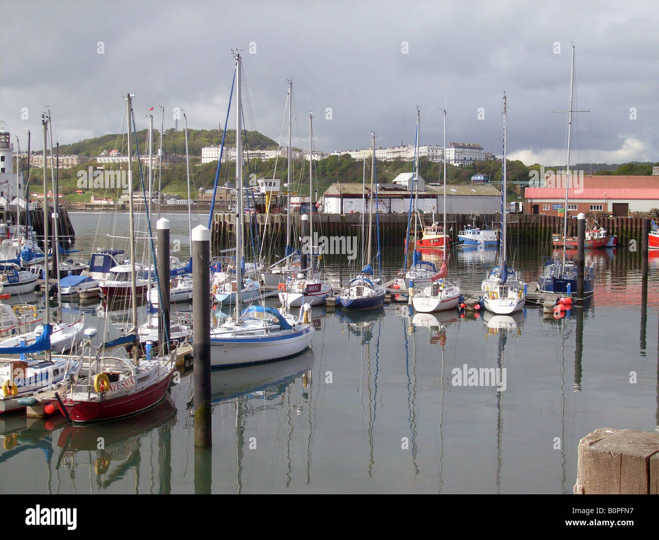 Fishing boats and yachts moored in Scarborough harbour, North Yorkshire, England. Stock Photo