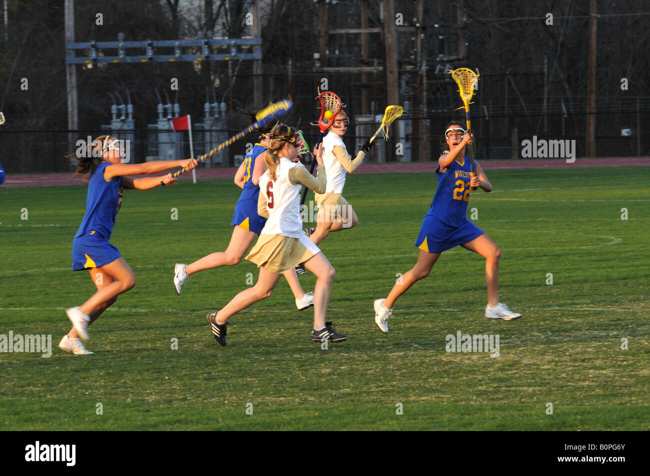 College women's lacrosse game action shot Stock Photo
