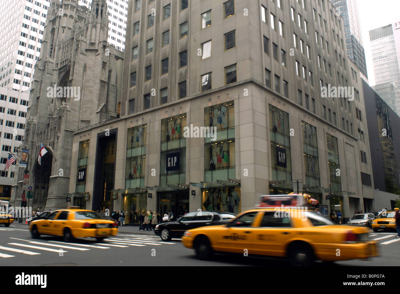 Traffic passes a Gap store in midtown New York Stock Photo