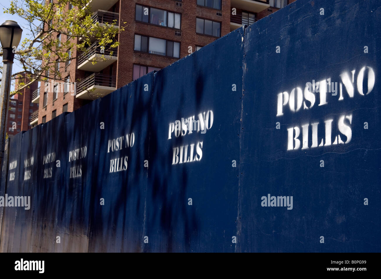 Post No Bills at construction site Stock Photo