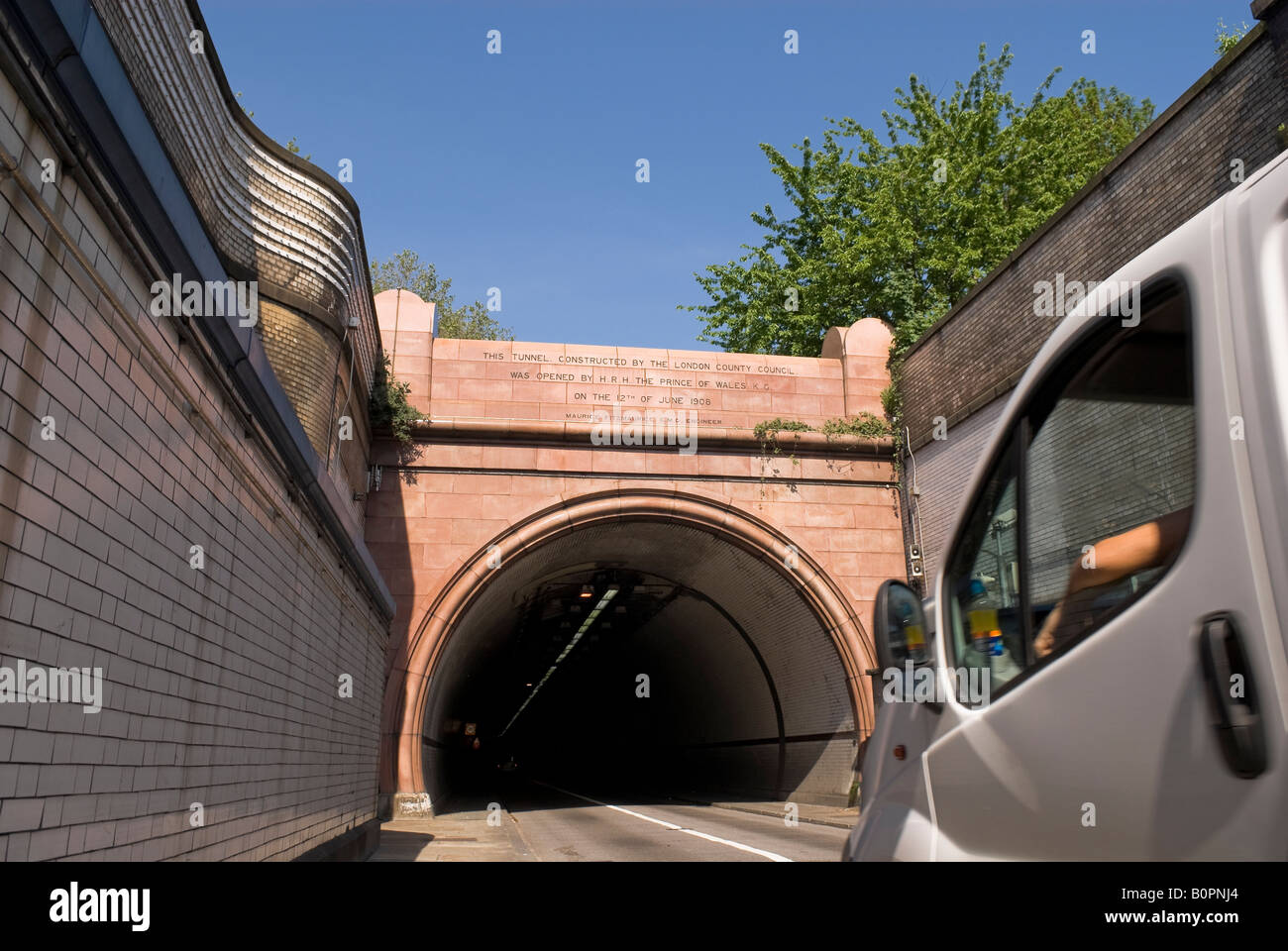 White van entering the Surrey side of the Rotherhithe Road Tunnel, London Stock Photo