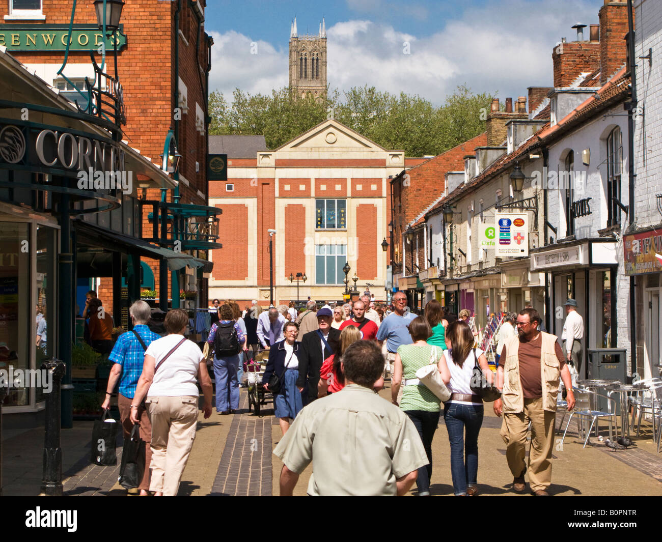 Shoppers outside the Cornhill Market in Lincoln city centre England UK