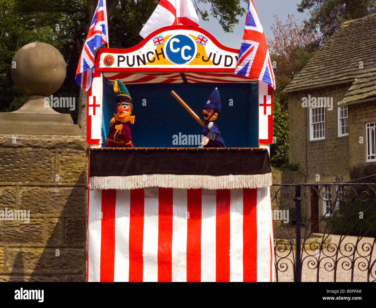 Traditional Punch and Judy Show with Policeman hitting Mr Punch Stock