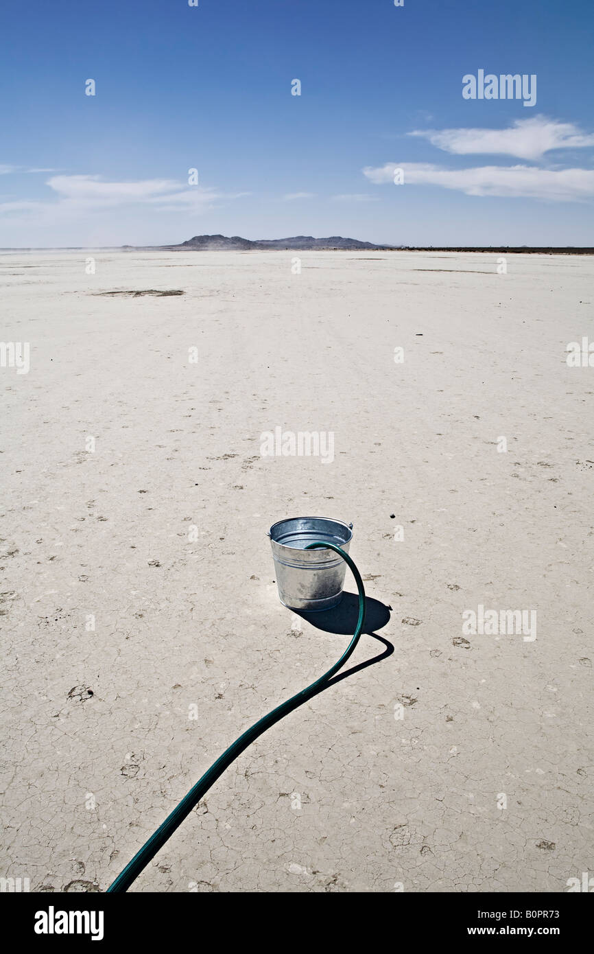 sand bucket with water hose