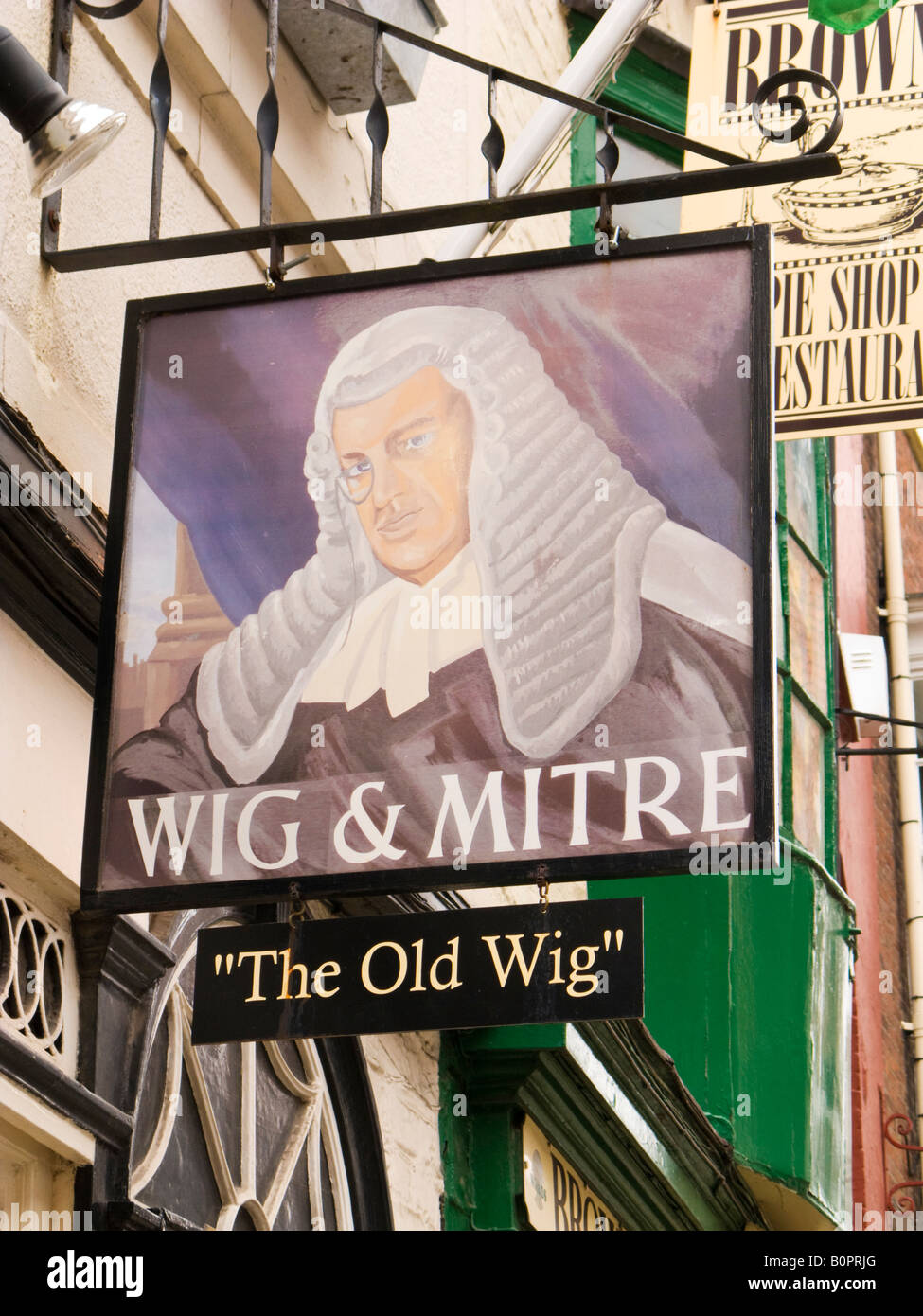 Traditional English pub sign - Wig and Mitre - at a pub in Lincoln, England, UK Stock Photo