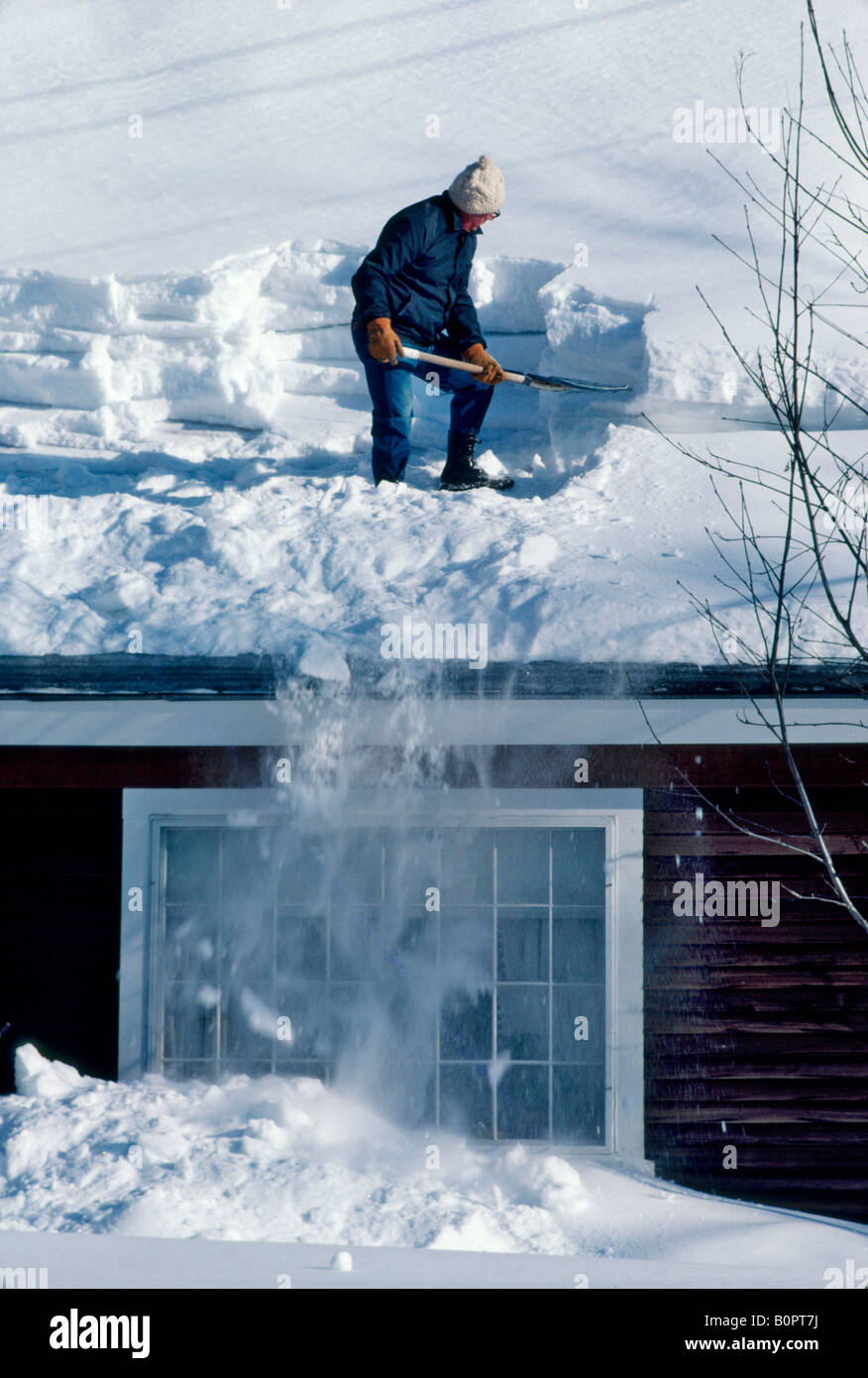 Old man shoveling snow hires stock photography and images Alamy