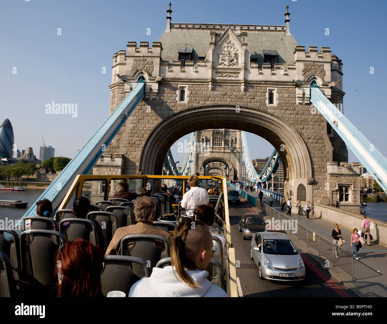 An Open Top Tourist Bus Crossing Tower Bridge London UK Europe Stock Photo