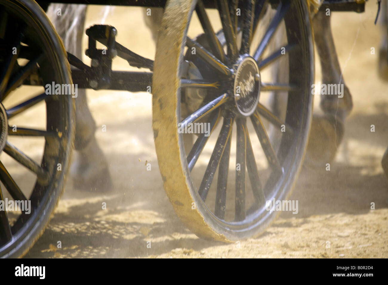 Wheels hooves horse drawn chariot Jerez Spain Stock Photo