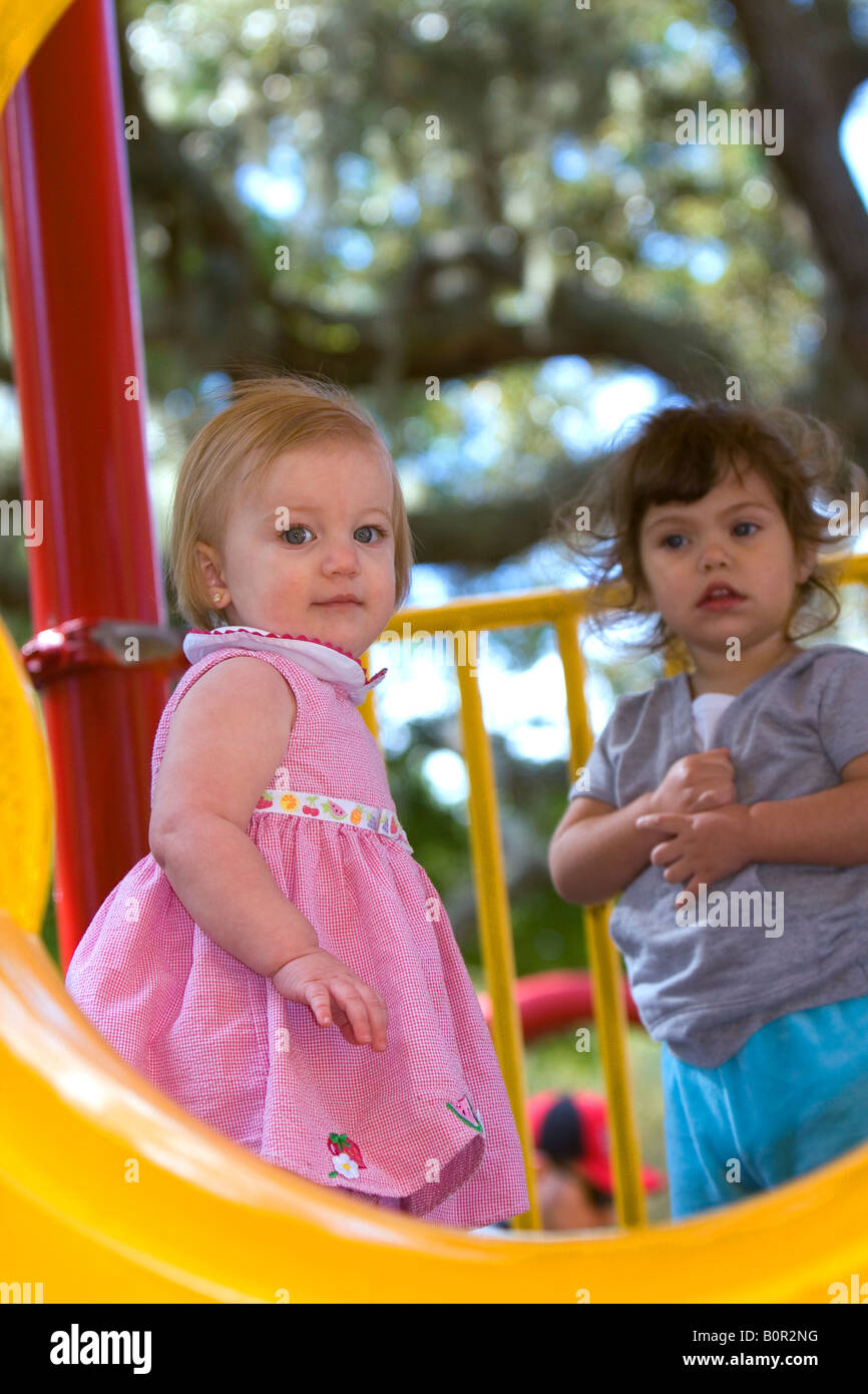 Young girls on playground equipment in Tampa Florida Stock Photo