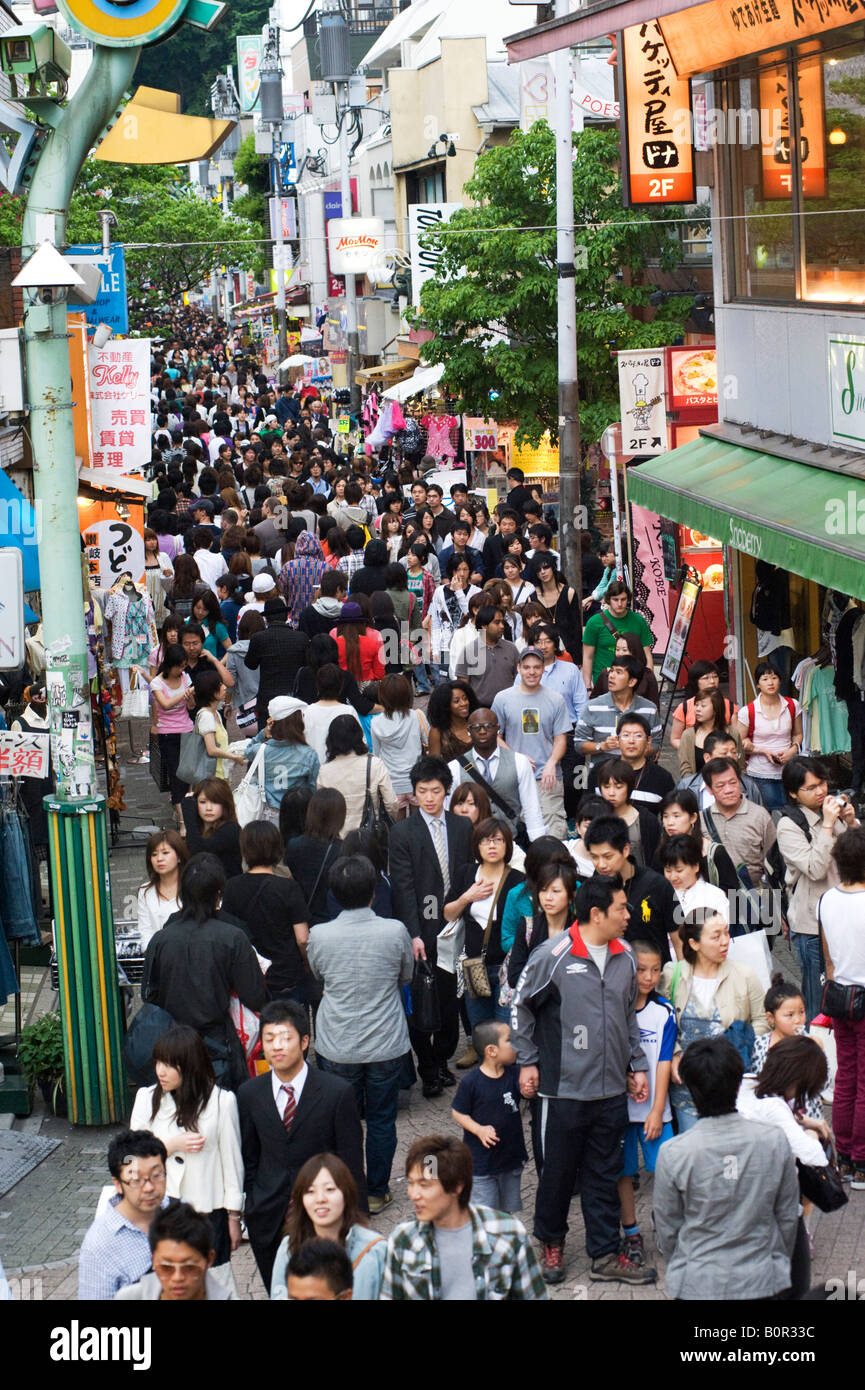 Many people walking along  busy Takeshita Street in Harajuku Tokyo Japan Stock Photo