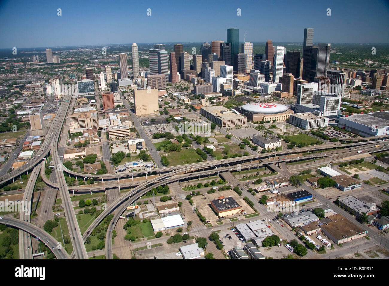 Aerial view of the freeway interchange of Interstate 45 and U S Highway 59 and downtown Houston Texas Stock Photo