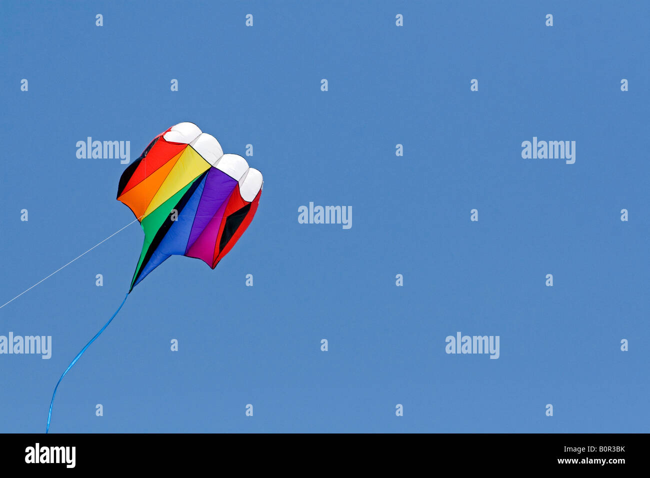 Kite flying in a blue sky at Galveston Texas Stock Photo Alamy