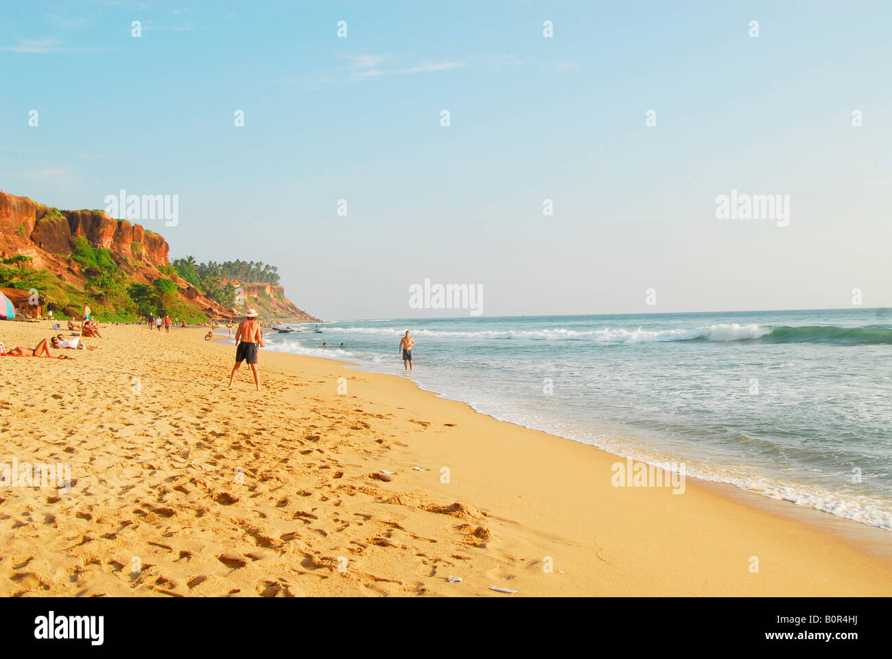 Varkala beach, kerala, india tourists sunbath fun Stock Photo