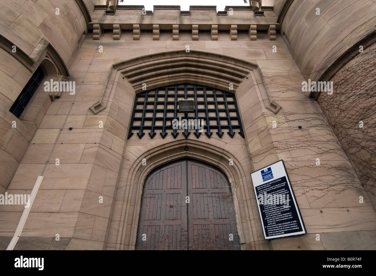 The entrance gate of the Victorian jail HMP Leicester Prison in Welford Road Leicester Stock Photo
