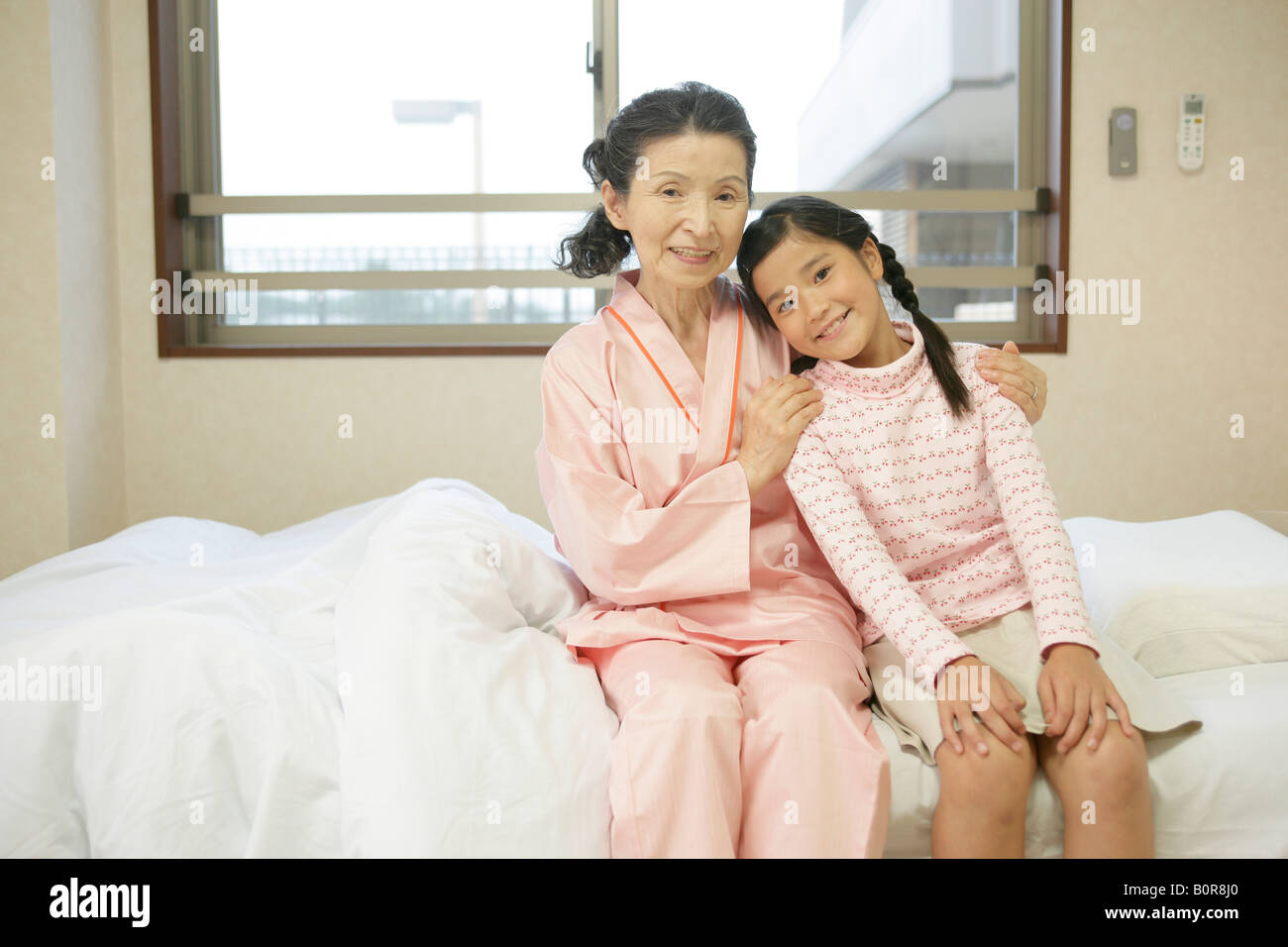 Asian girl sitting on hospital hi-res stock photography and images - Alamy