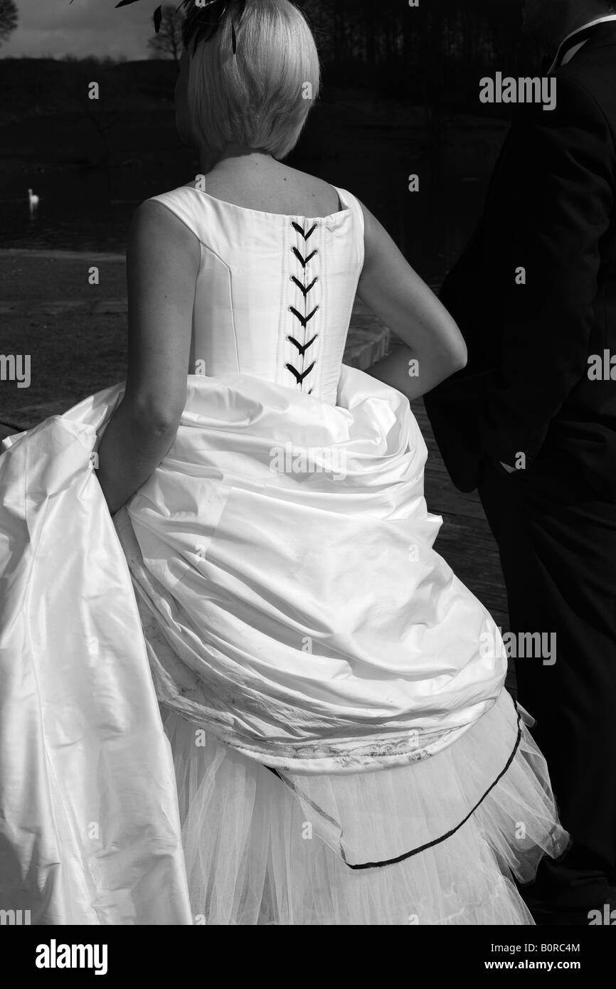 White wedding dress with black detailing Stock Photo - Alamy