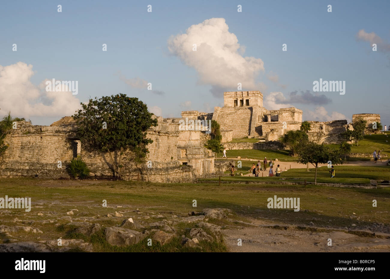General Aspect of Tulum archaeological site on a bright sunny day with blue sky and white clouds Stock Photo