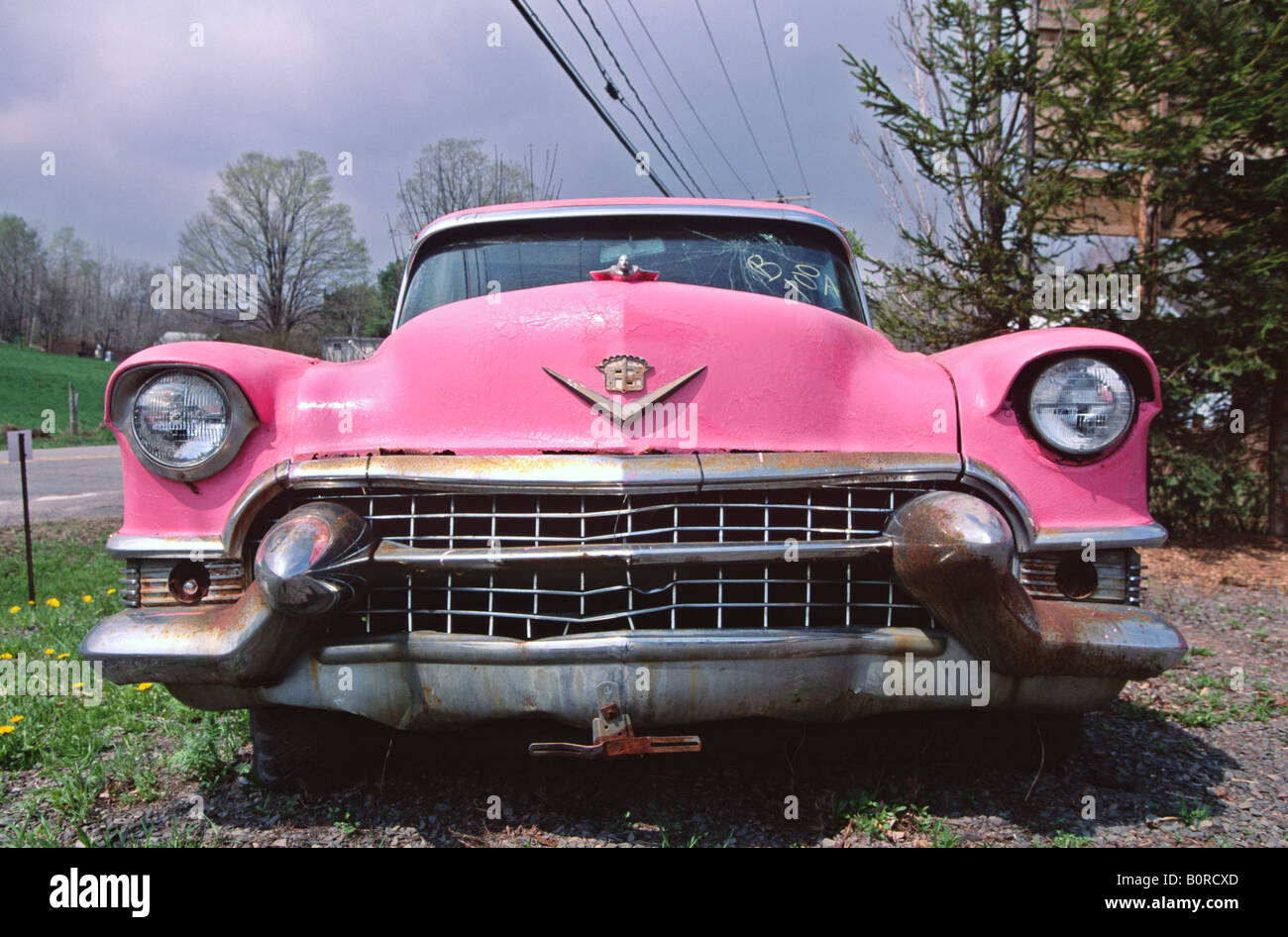 Pink Cadillac rusting by the roadside New York State USA Stock Photo