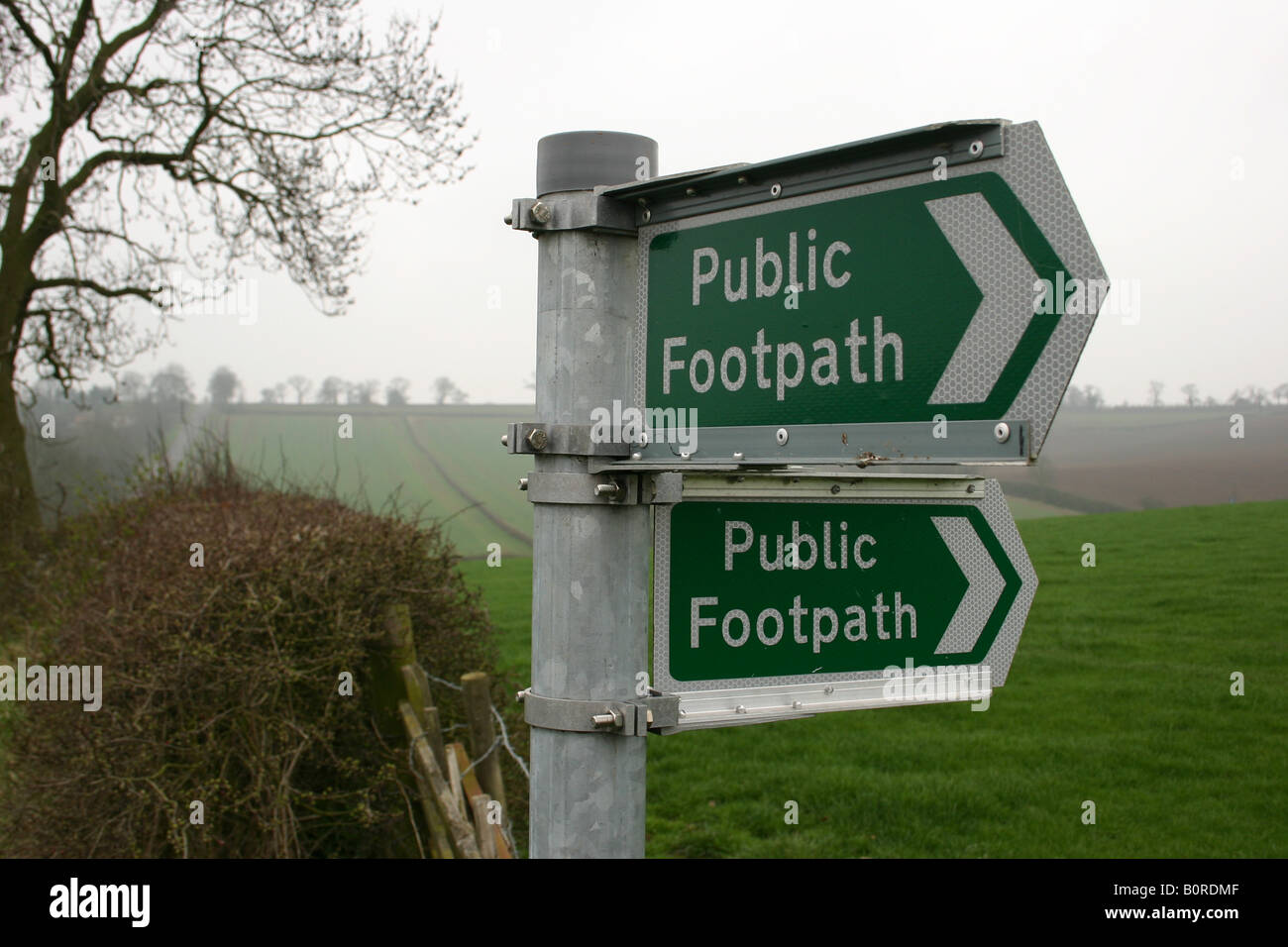 A public footpath sign in the English countryside. Stock Photo