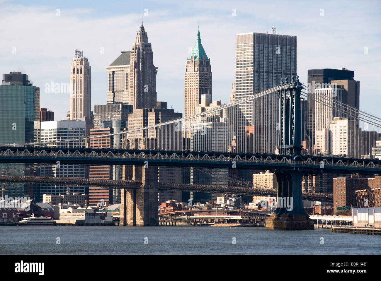 Skyline of New York in front the Brooklyn Bridge Stock Photo - Alamy