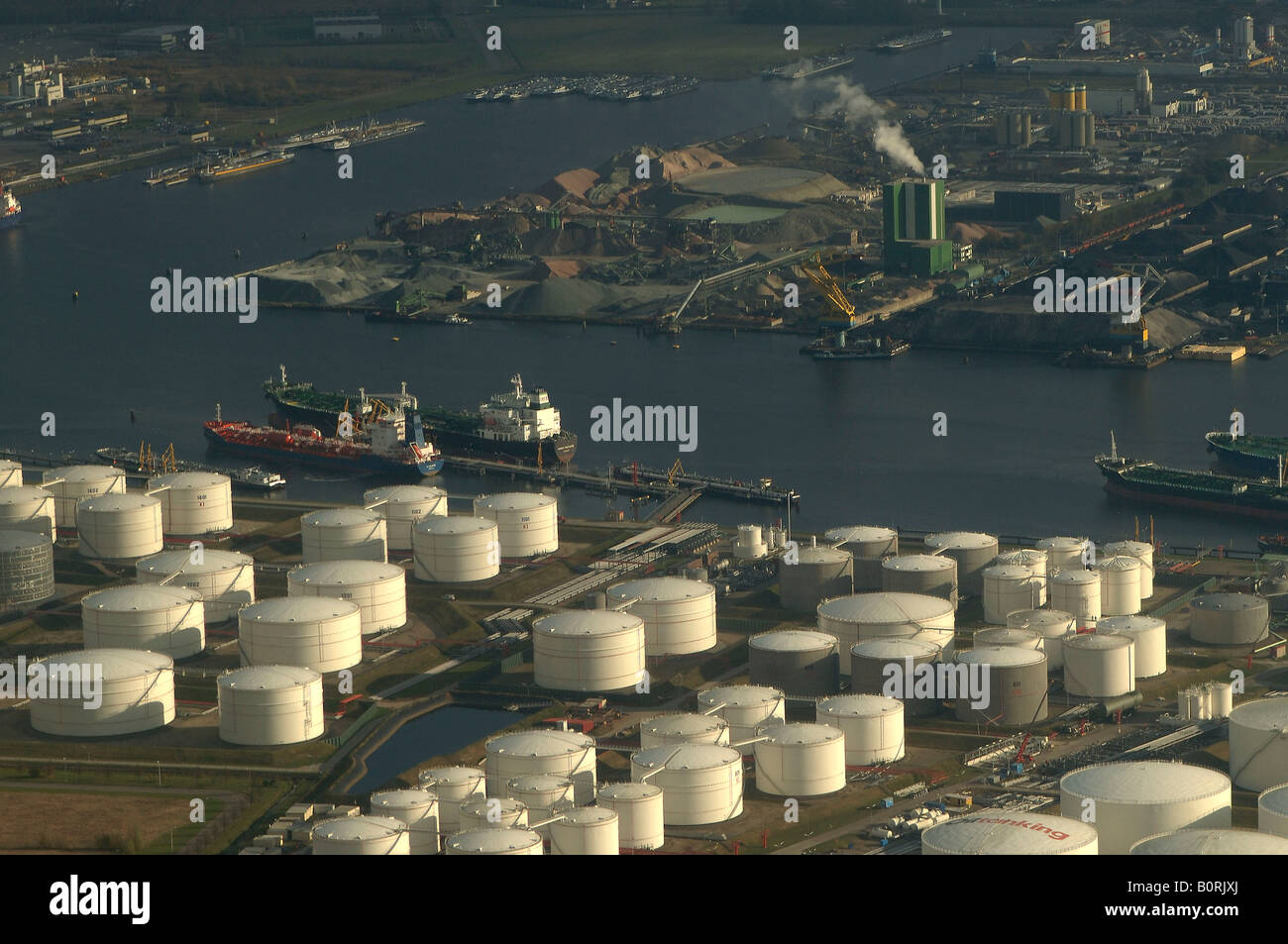 Aerial view of Port of Amsterdam and oil terminal tank crude oil storage Stock Photo