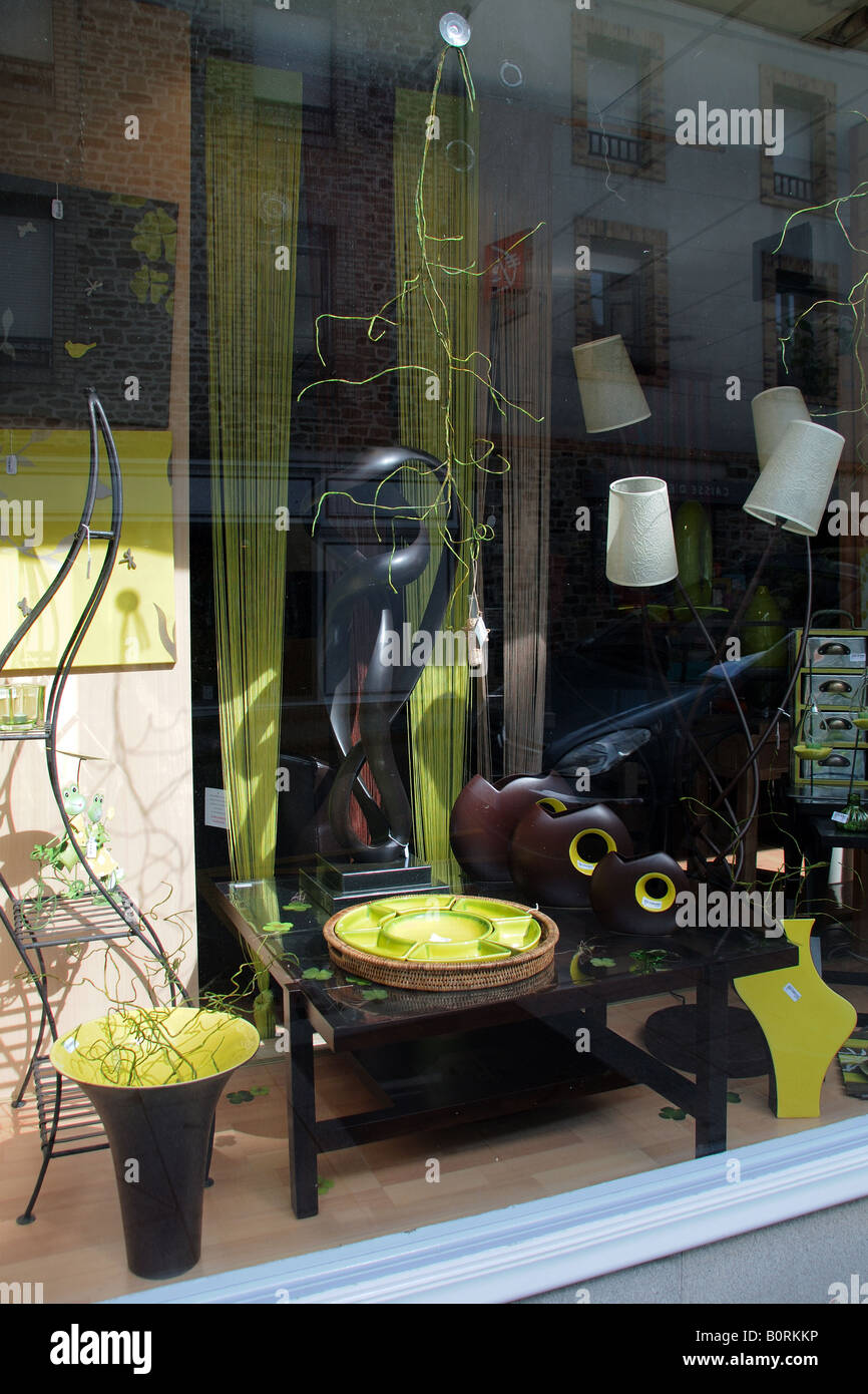 A shop window display of modern furniture and lifestyle items in the town of Vitre Brittany France Stock Photo