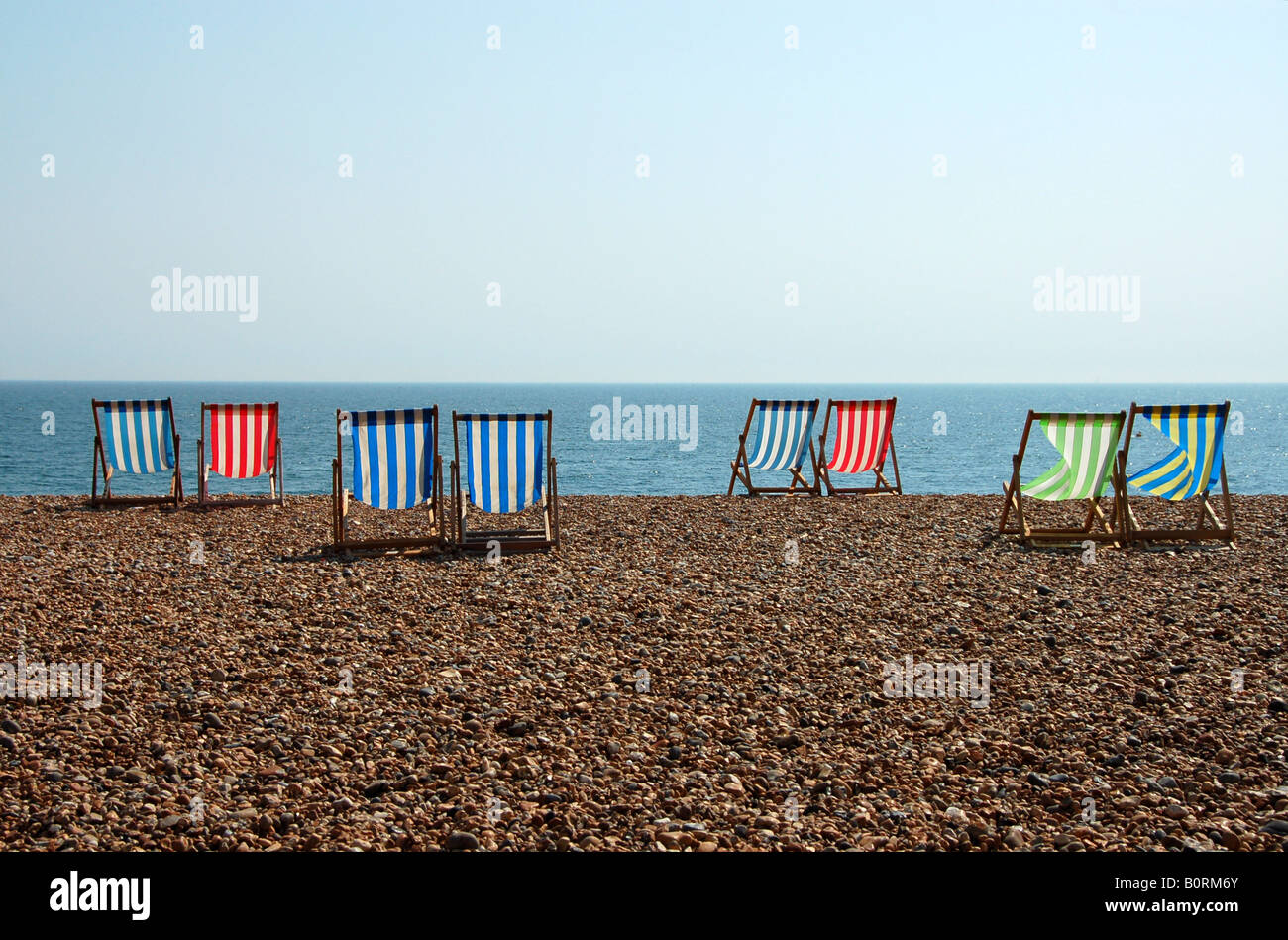 Deckchairs on Brighton beach, UK Stock Photo Alamy