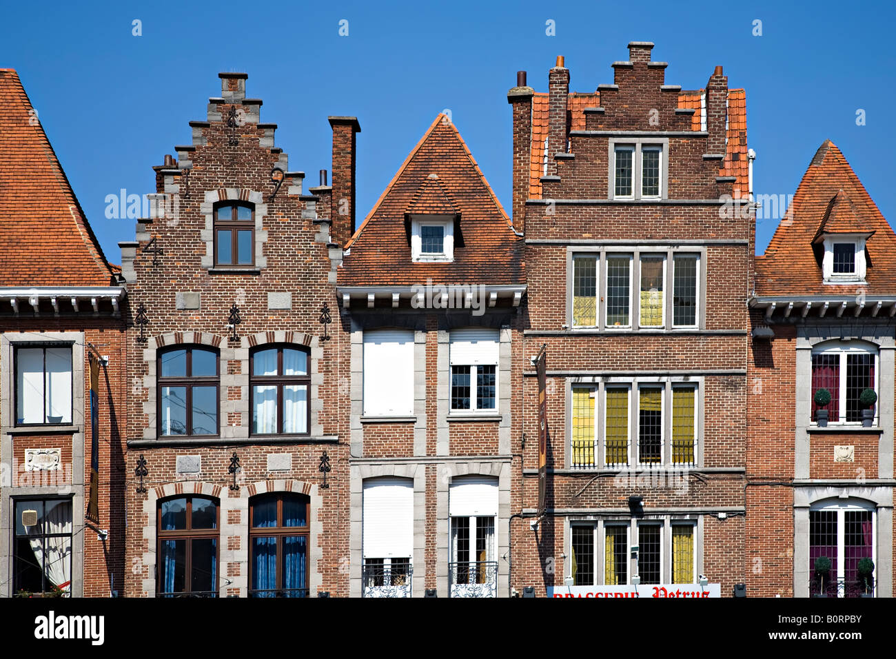 Traditional brick gable architecture on houses and shops Tournai Belgium Stock Photo