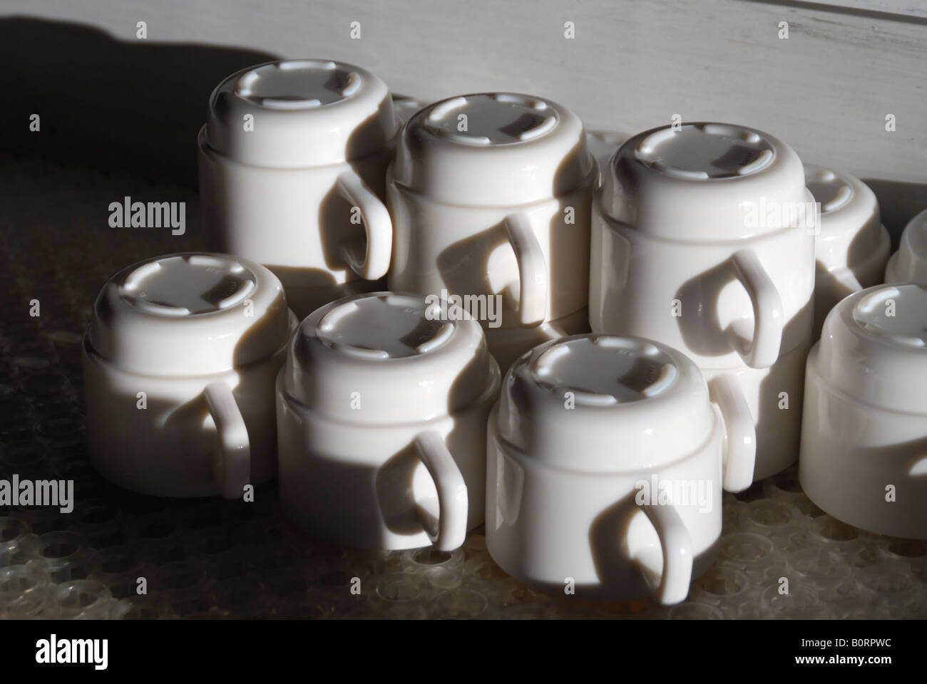 The range of the reversed coffee cups Stock Photo