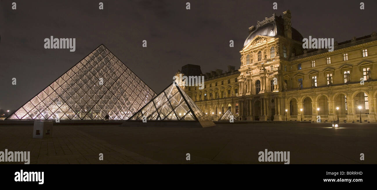 the Louvre museum by night, louvre musée in teh city of paris france Stock Photo